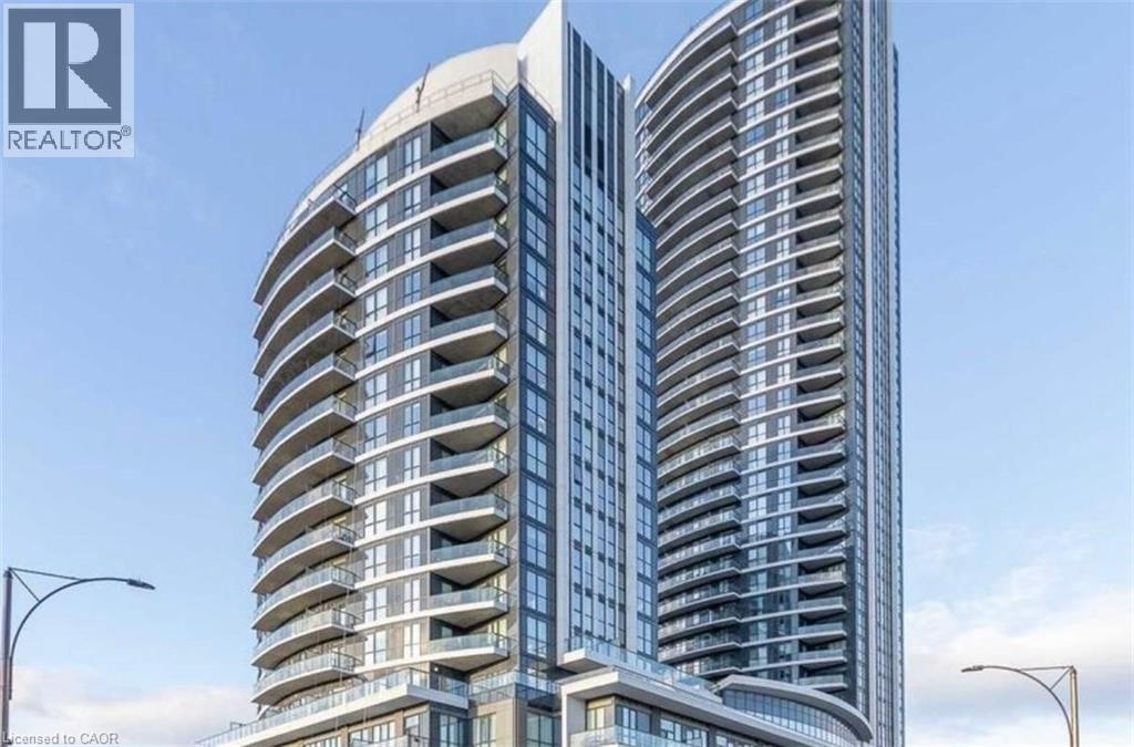 A tall, modern building with curved balconies is shown.