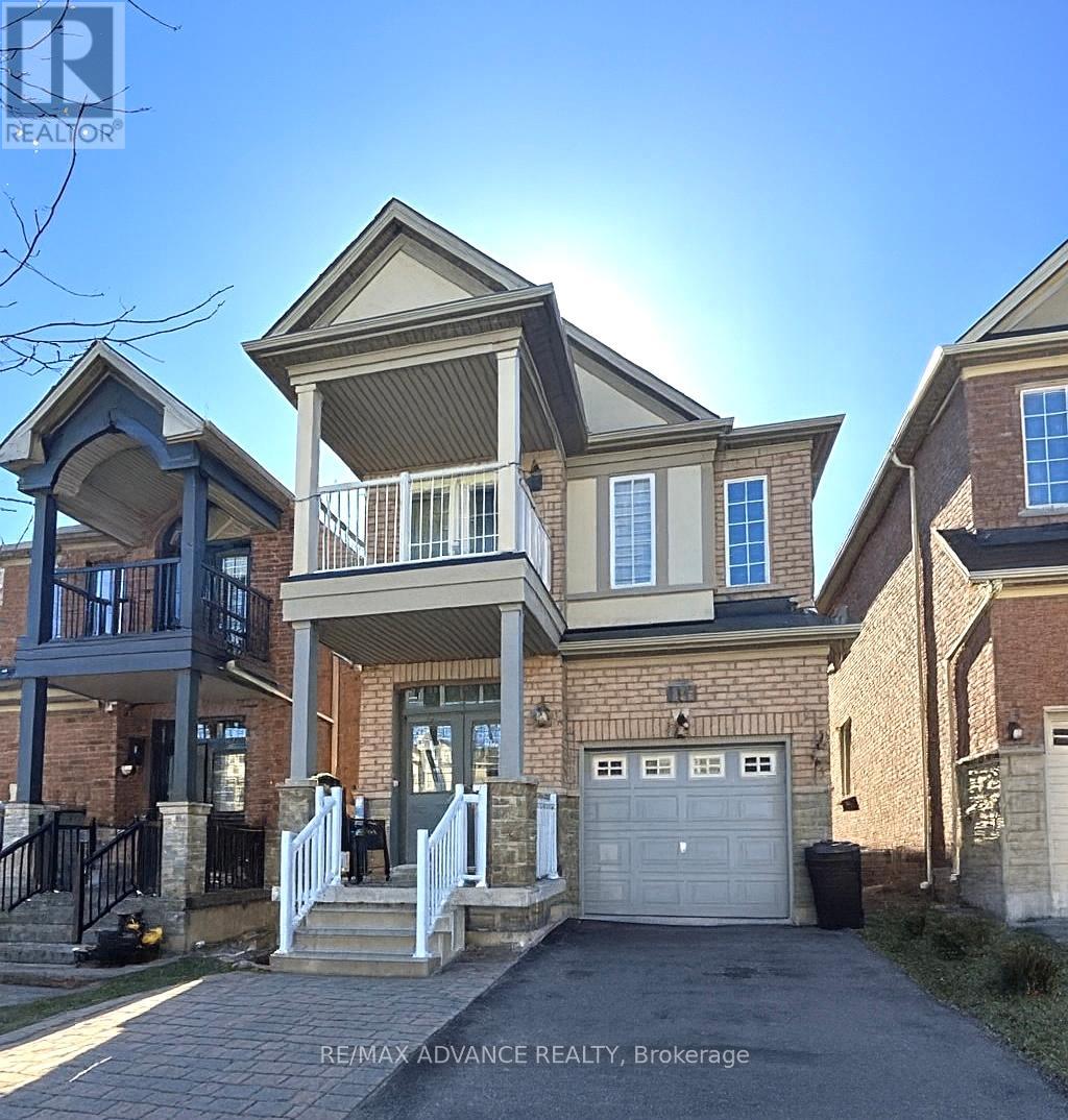 A house with a garage and a balcony is for sale.