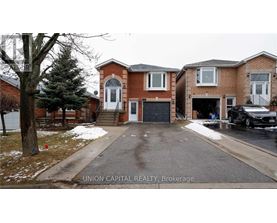 A house with a white garage door is for sale.