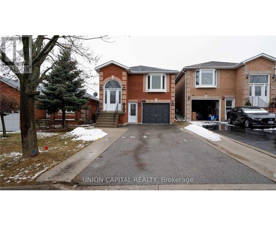 A house with a white garage door is for sale.