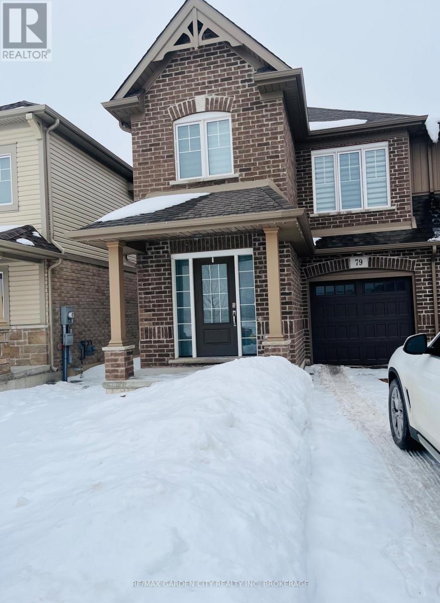 A house with a car parked in front of it.