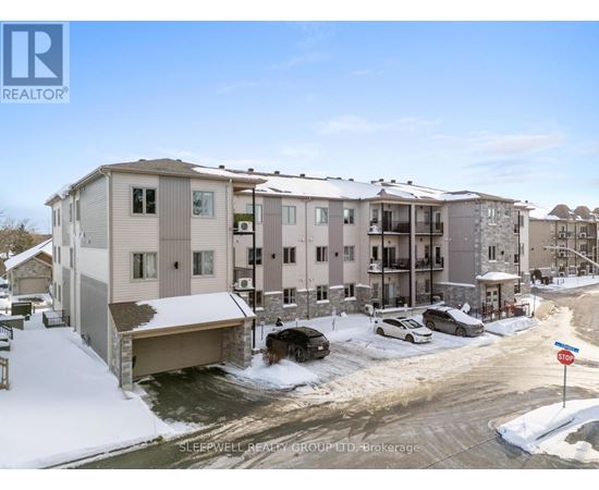 A Sleepwell Realty Group brokerage office is shown in a snowy setting.