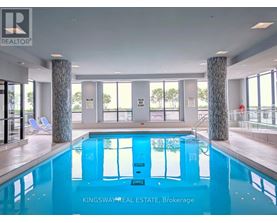 A Kingsway Real Estate brokerage office with a pool.