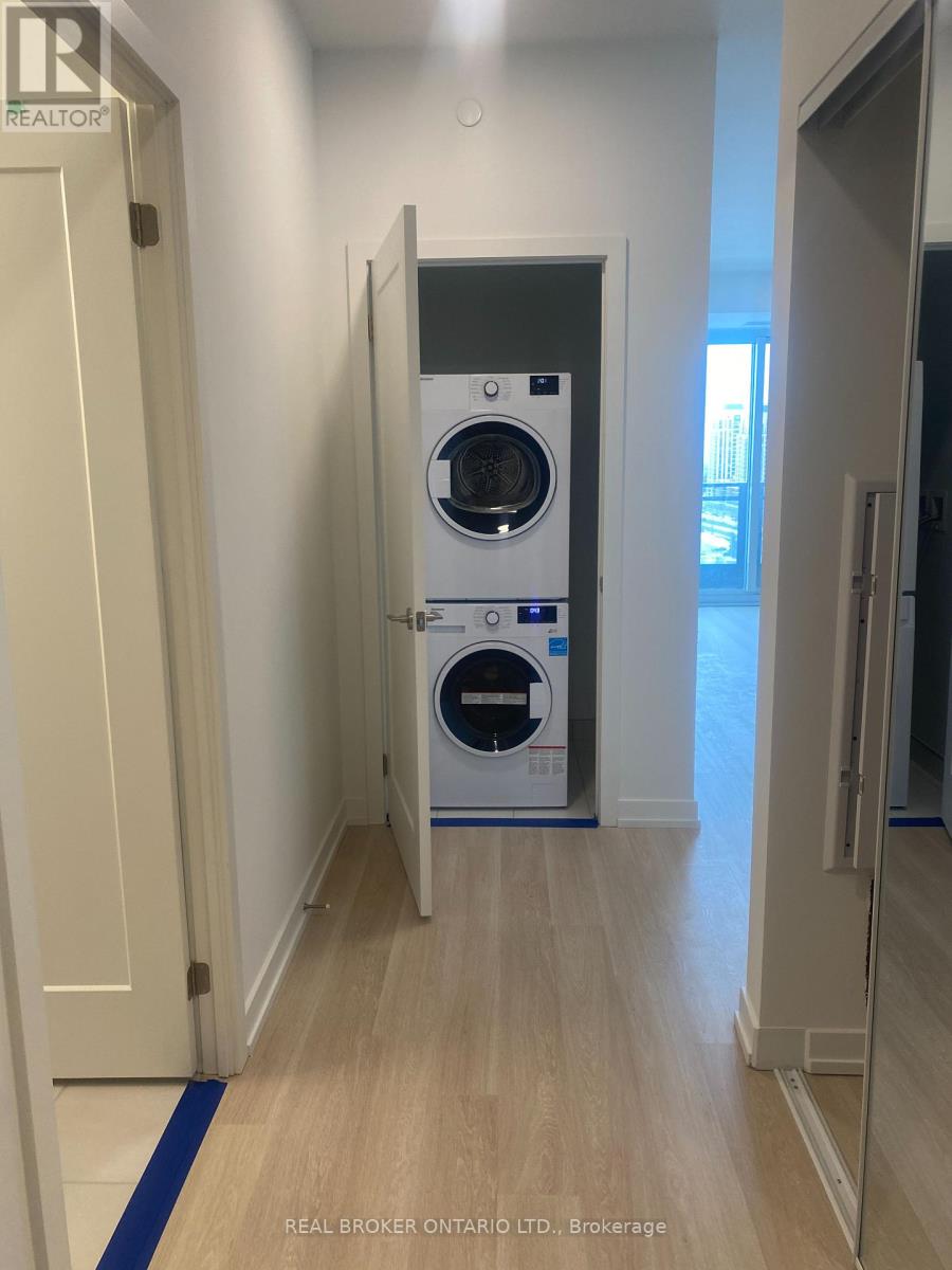 A washer and dryer in a hallway.
