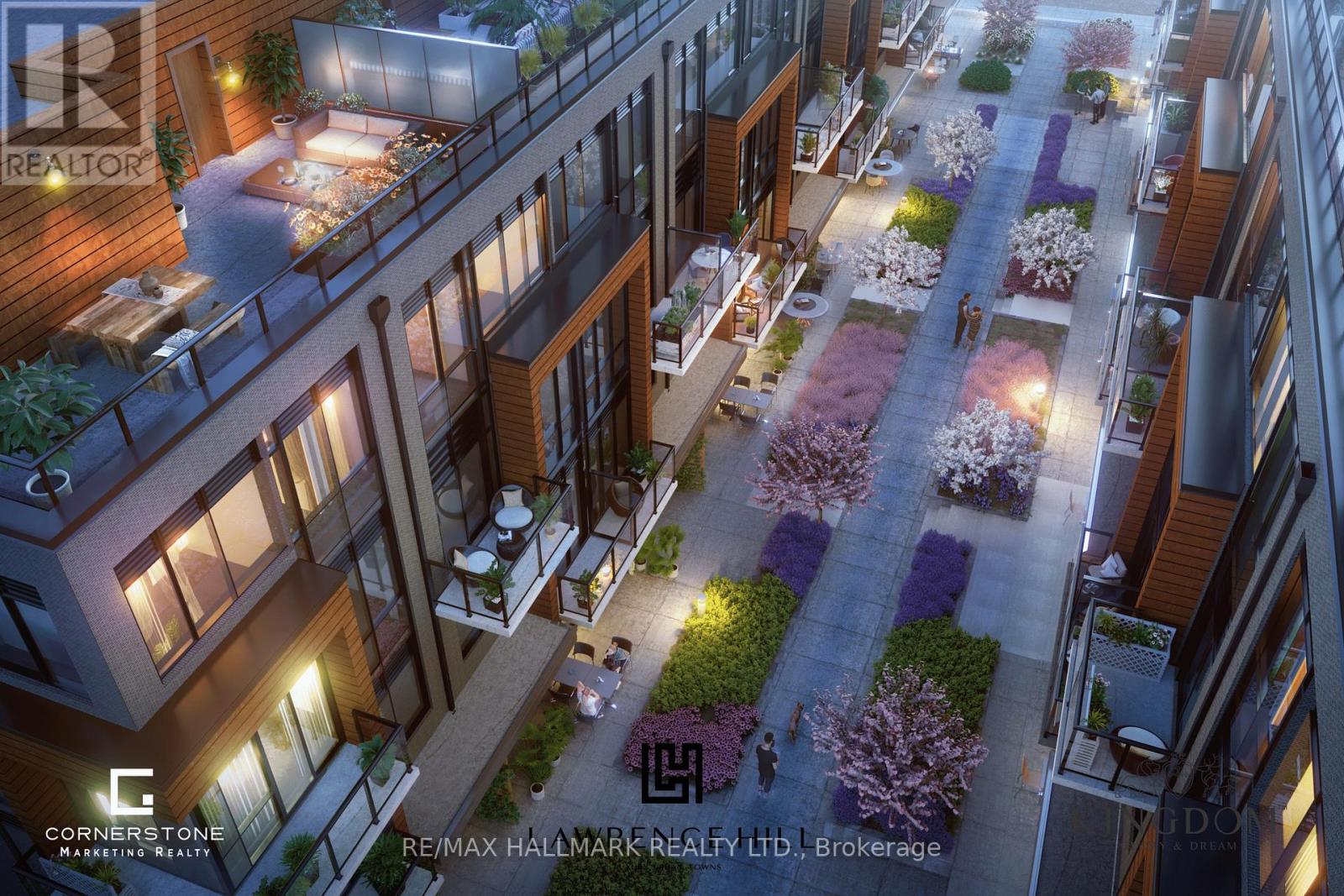 A modern apartment complex with a well-maintained garden area.