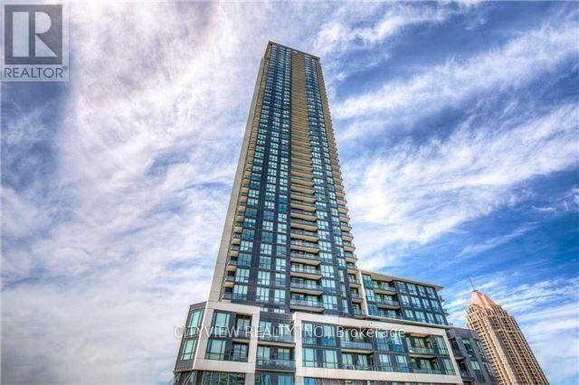 A tall building with the words "View Realty No Brokers" on the front.