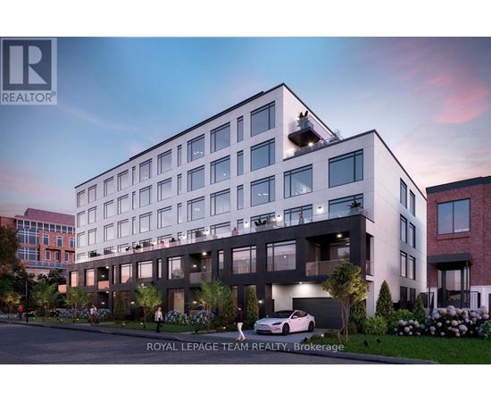 A modern building with a car parked in front of it.