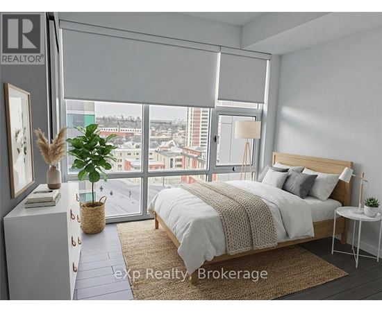 A bedroom with a large bed and a view of the city.