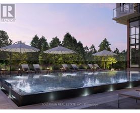 A pool area with lounge chairs and umbrellas is shown.