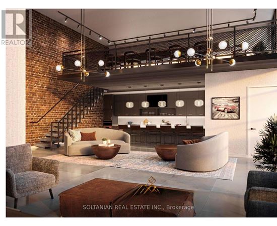 A modern living room with a staircase and a fireplace.
