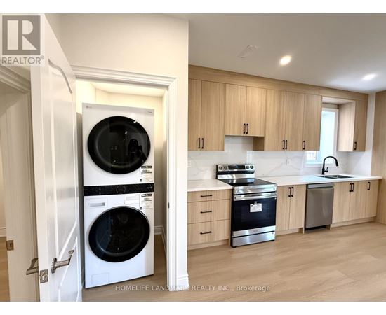 A modern kitchen with wooden cabinets and a stainless steel dishwasher and oven.