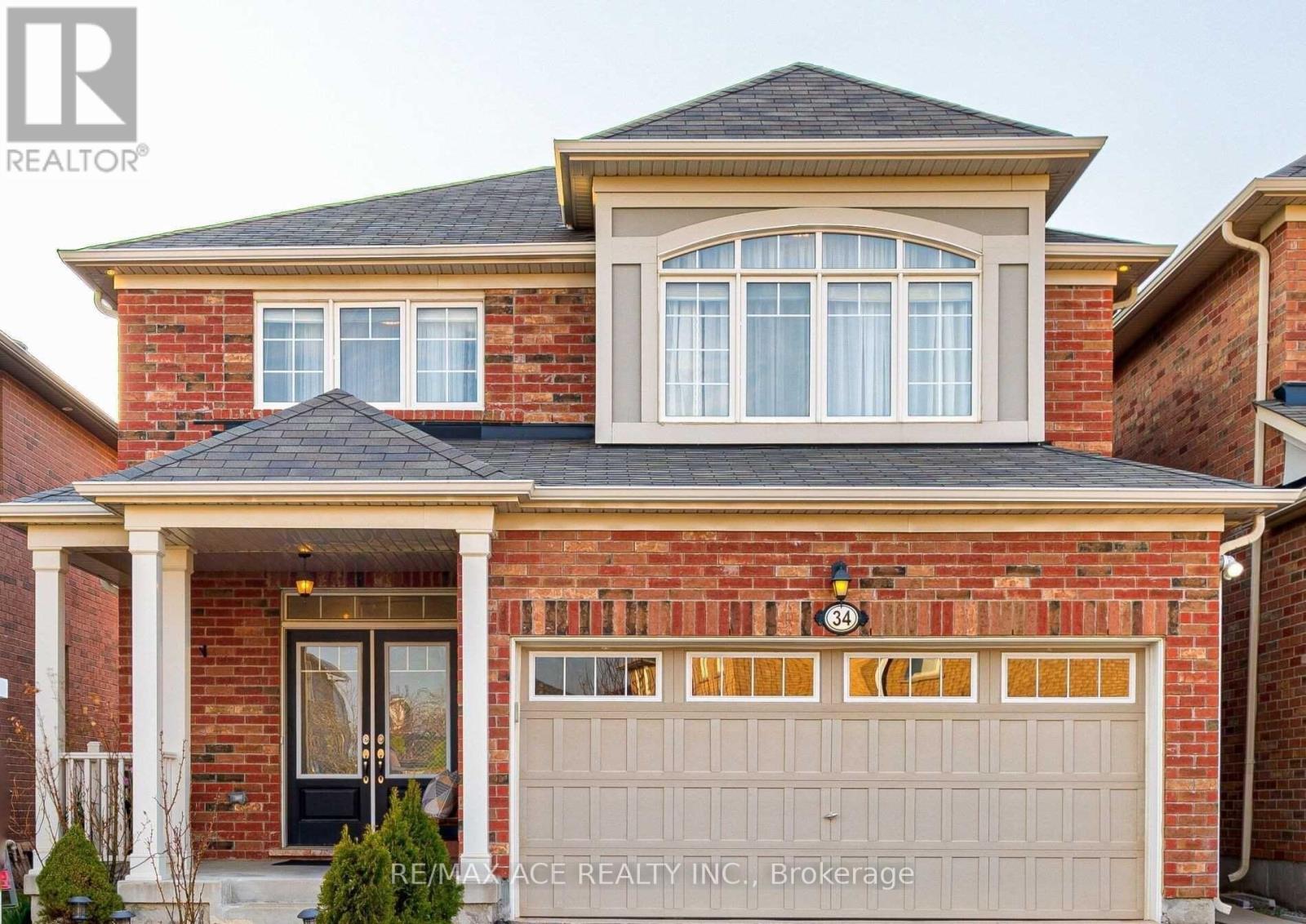 A house with a garage door and a window is shown.
