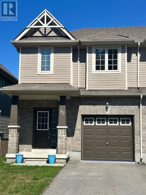 A house with a garage door and a window.