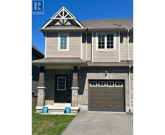A house with a garage door and a window.