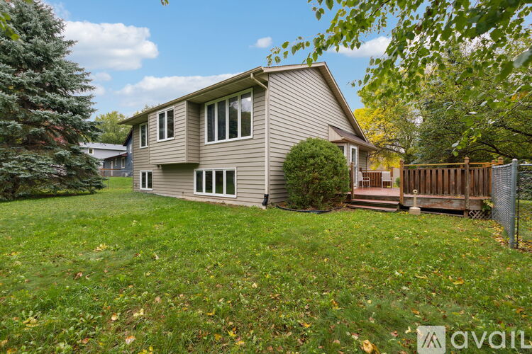 A house with a lawn in front of it is for sale.