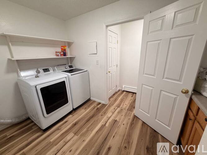 A small kitchen with a microwave and oven.