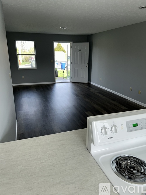 A room with a washer and dryer in it.