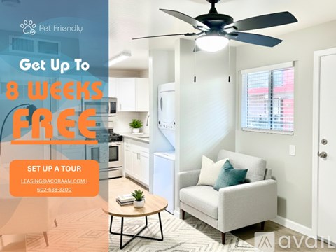 A living room with a kitchen in the background and a sign advertising a free first month for a move in special.