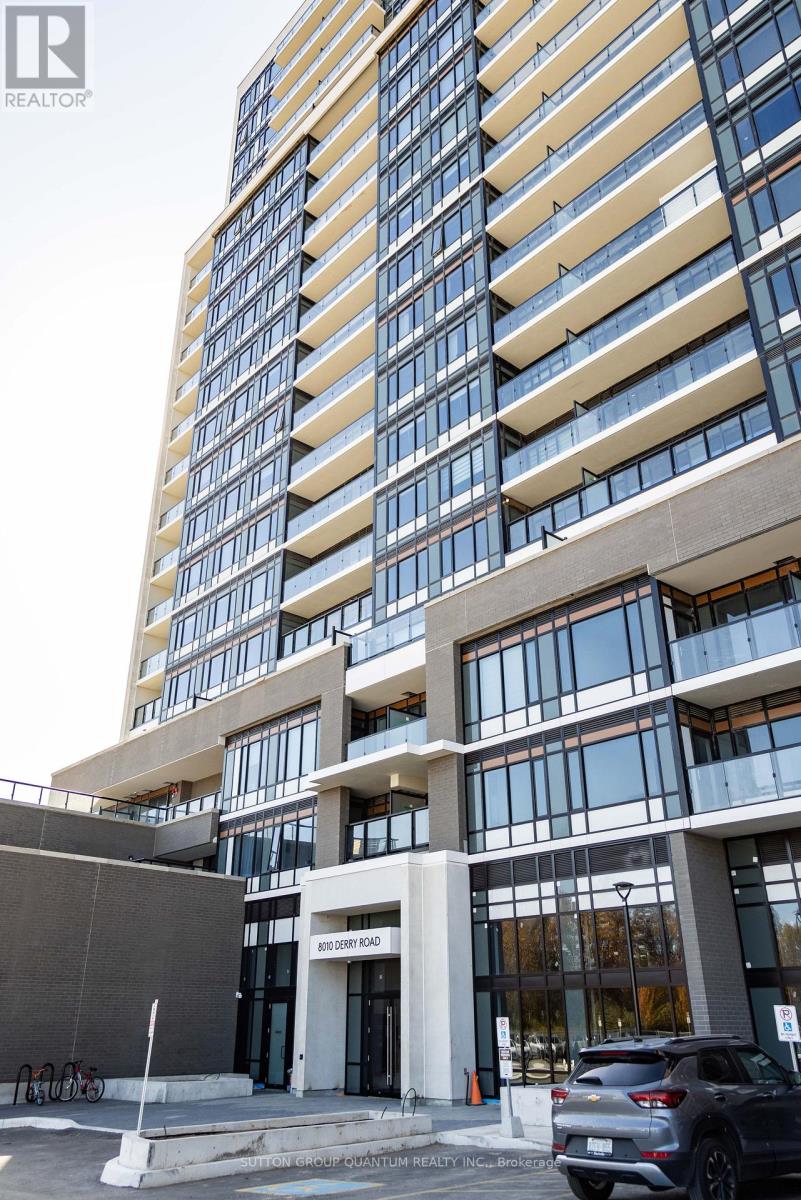 A tall building with a lot of windows and balconies.