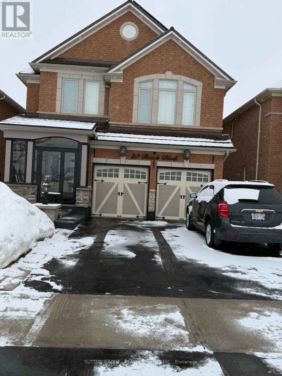A house with a car parked in front of it.