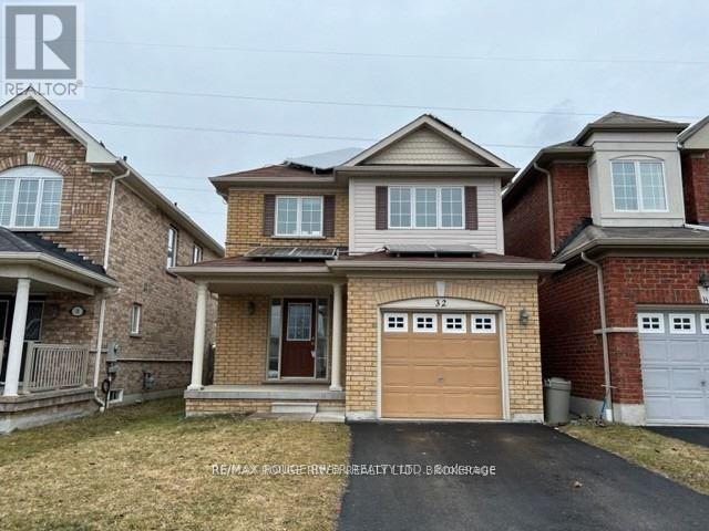 A house with a brown garage door is for sale.