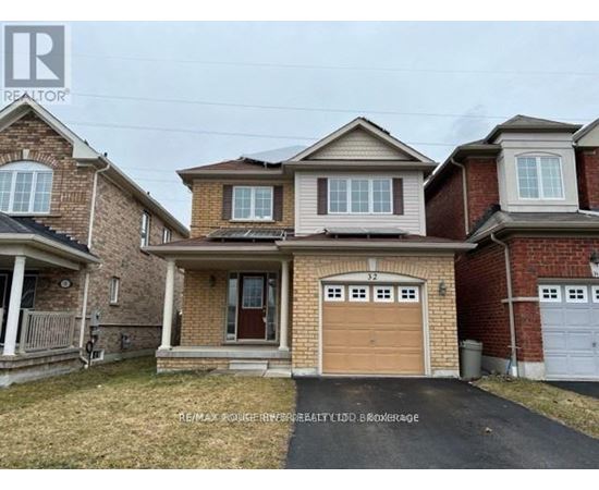 A house with a brown garage door is for sale.