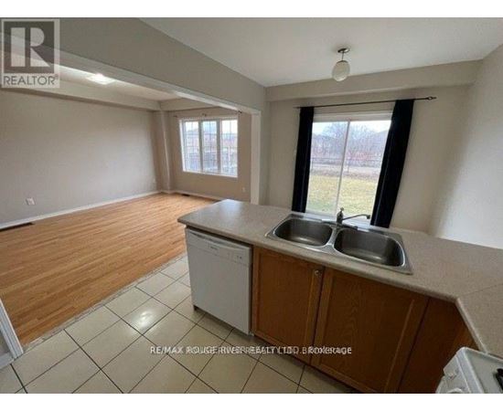 A kitchen with a dishwasher and a sink.
