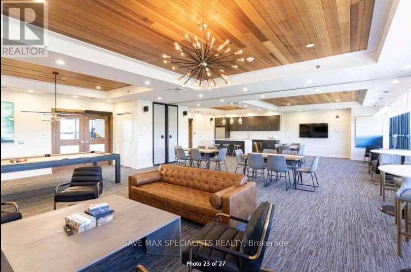 A modern living room with a wooden ceiling and a large sectional sofa.