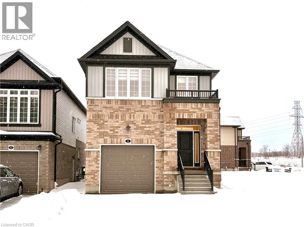A house with a brown garage door is in front of a house with a black garage door.