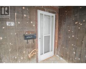 A door with a glass panel and a sign that says "LOWER A".