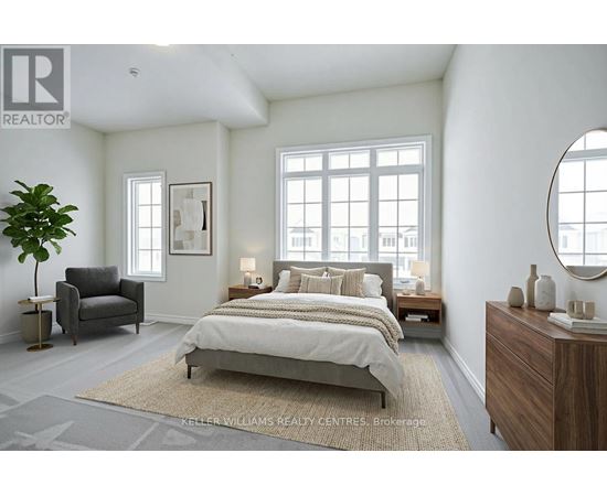 A bedroom with a large bed, a chair, and a plant.