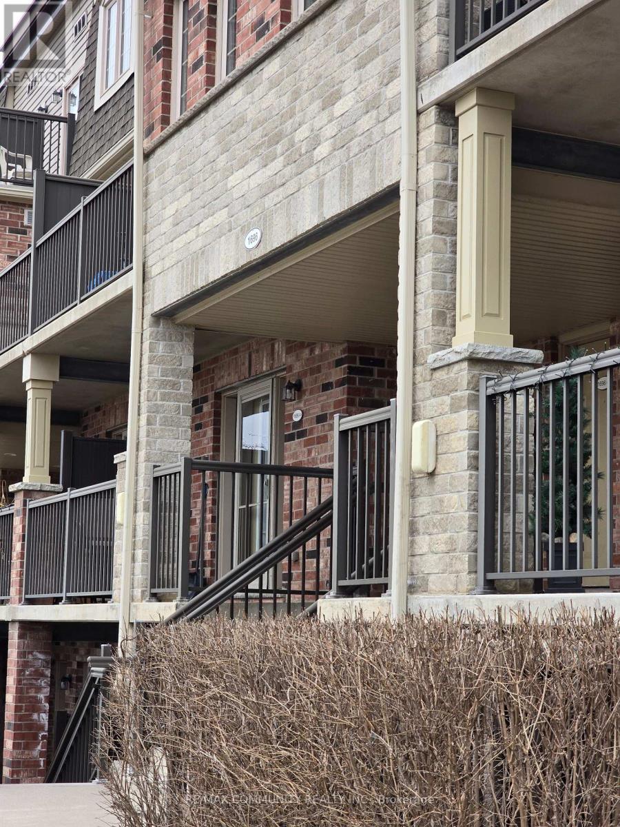 A building with a balcony and a staircase.