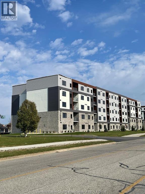 A large building with a lot of windows and balconies.