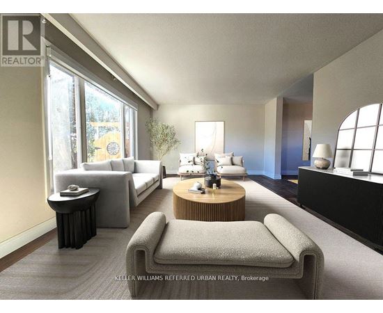 A modern living room with a grey sofa and a wooden coffee table.