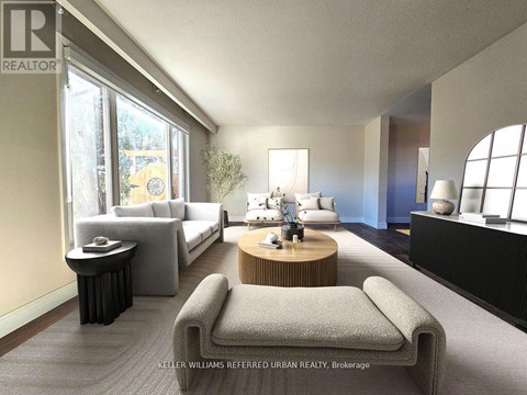 A modern living room with a grey sofa and a wooden coffee table.