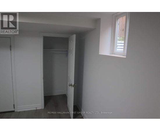 A room with a door and a window.