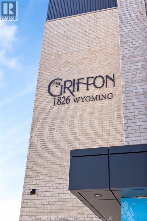 The Griffon 1826 Wyoming building has a sign on it.