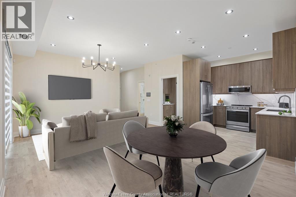 A well-lit, modern living room with a dining area in the background.