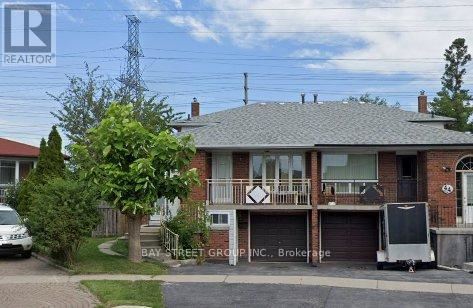 A house with a sign that says REALTOR in the corner.