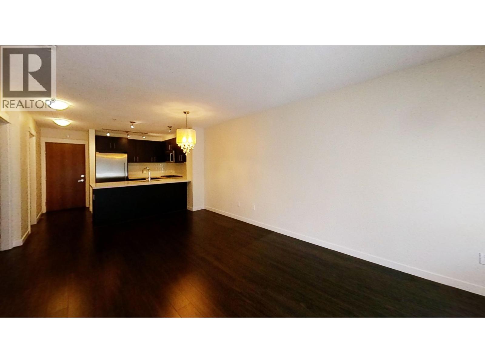 A realtor logo is on the top left corner of the image.