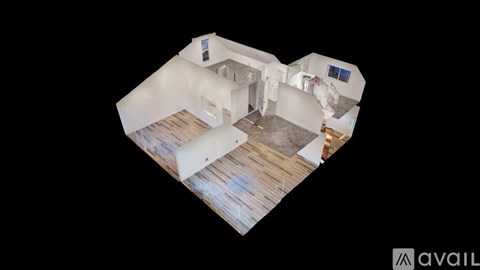 A top-down view of a house interior with a kitchen, living room, and bedrooms.