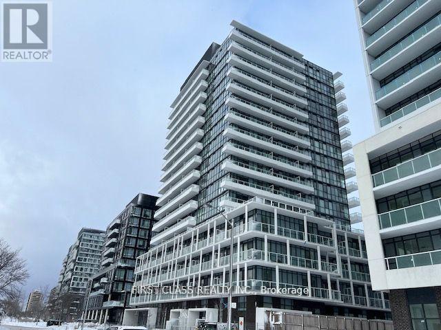 A tall building with the words "BIRTISCLASS REALTY" on it.