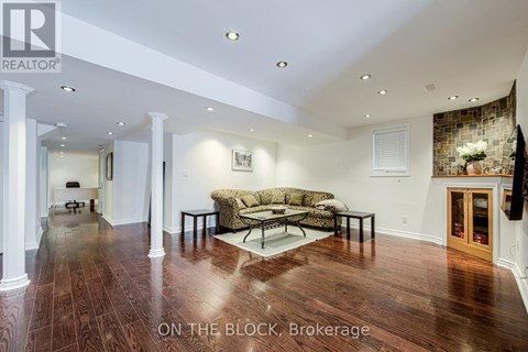 A spacious living room with a couch and a coffee table.