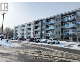 A building with the text EXP REALTY, Brokerage on the bottom.