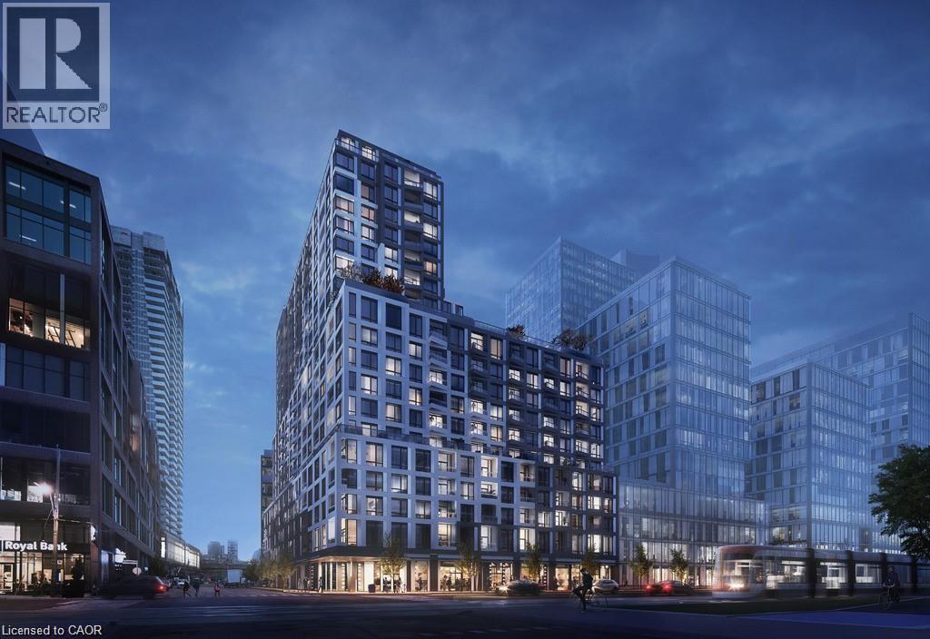 A modern building complex with glass facades and multiple floors is depicted in the image.
