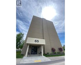 The building number 65 is visible in front of the building.