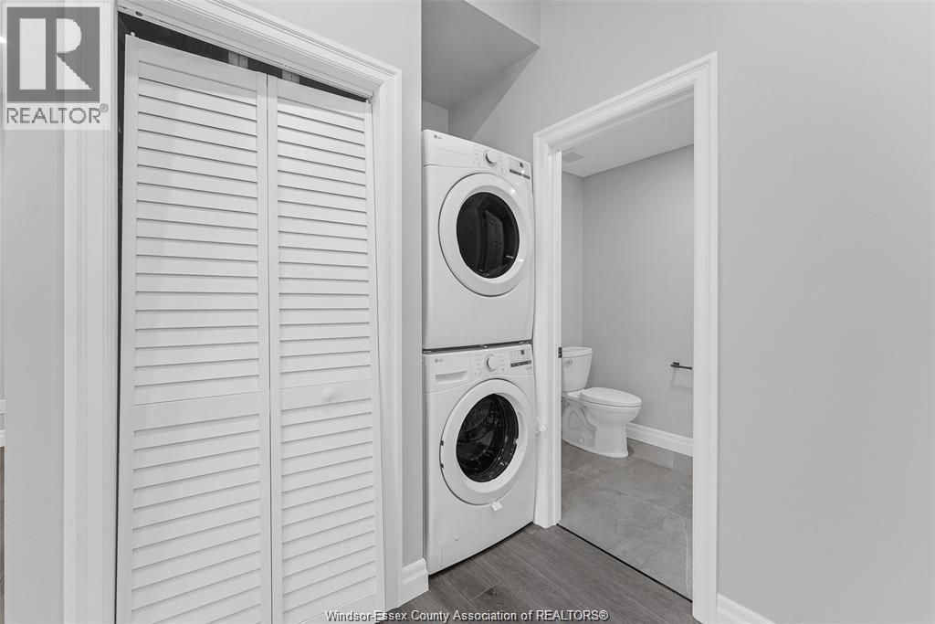 A washer and dryer in a small laundry room.