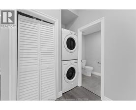 A washer and dryer in a small laundry room.