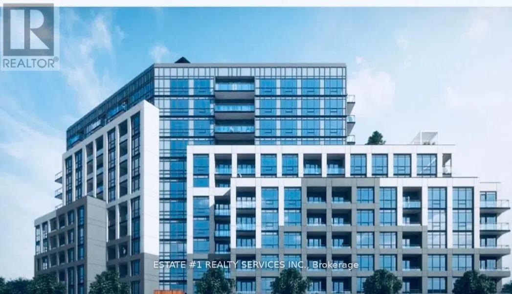 A modern multi-story building with the logo "REALTOR" on the top left corner.