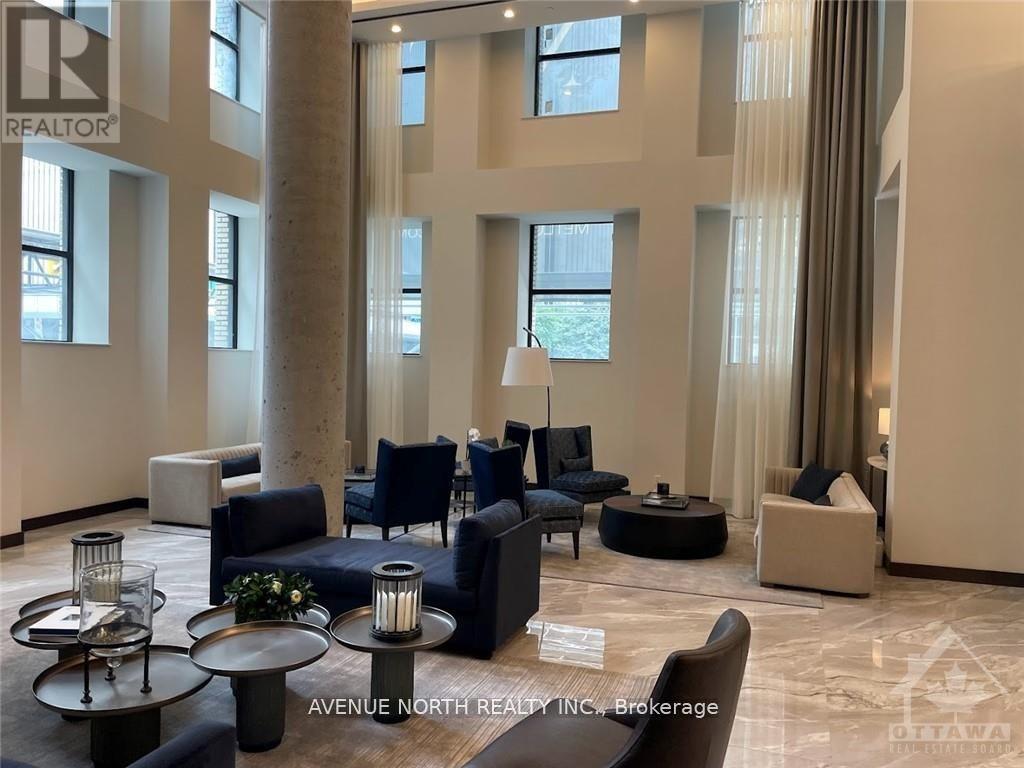 A living room with a large couch and a coffee table.
